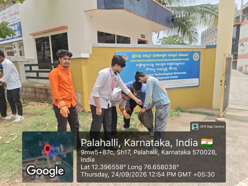 The photograph shows an NSS Cleanliness Drive conducted by student volunteers on the college campus.