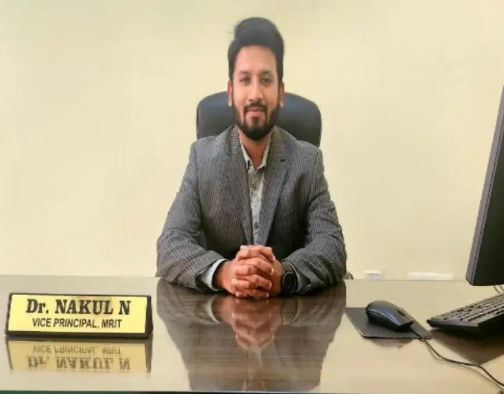 Dr NAKUL N